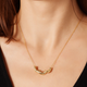 Photo of Panera gold necklace with three gold noodles